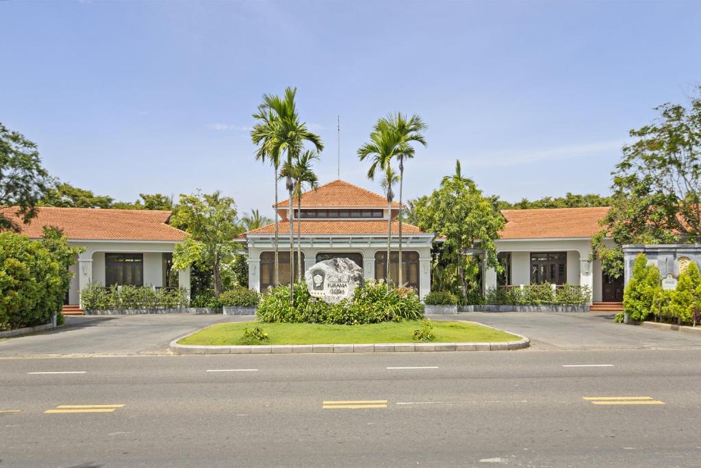 an empty road in front of a house at Resort Villa Da Nang Luxurious Abogo in Da Nang