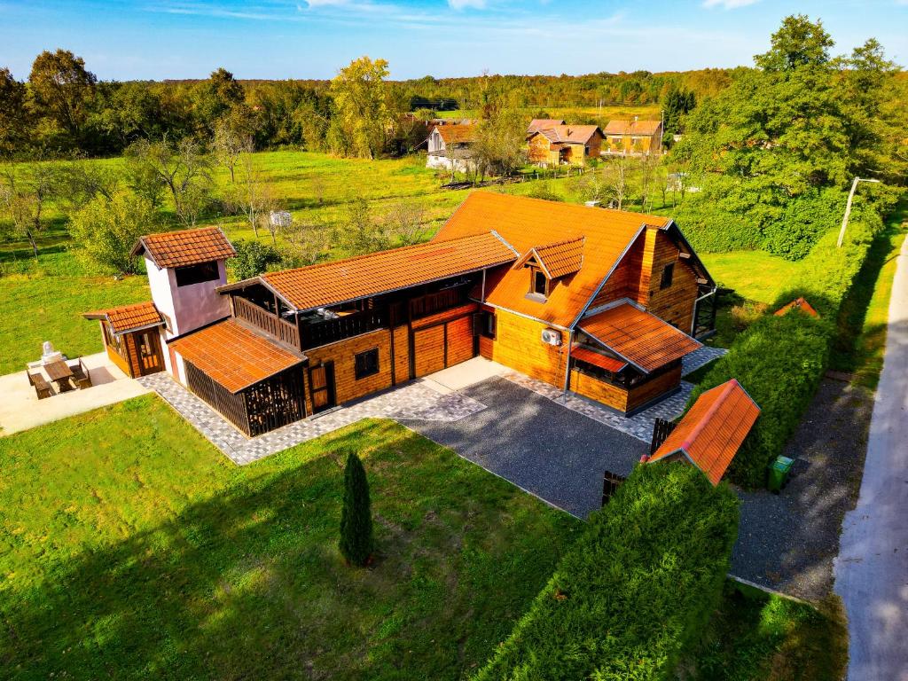 an overhead view of a house in a field at Ranch Falcone in Hrvatska Dubica