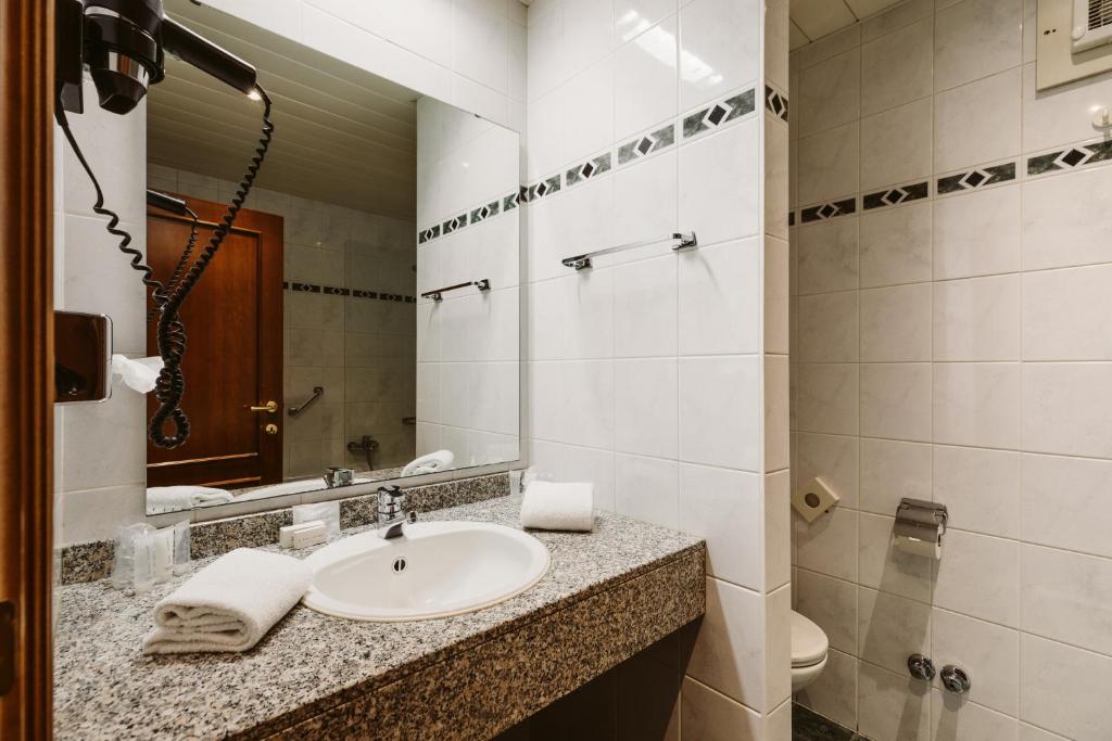Koupelna v ubytování Serwir Hotel