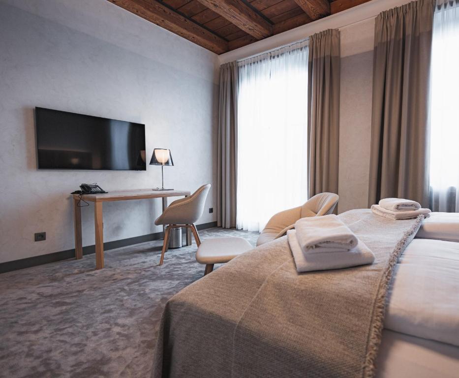 Postel nebo postele na pokoji v ubytování Hotel ALBRECHT