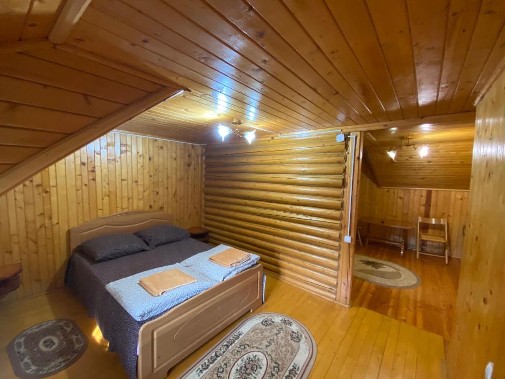 Postel nebo postele na pokoji v ubytování Pid Playem