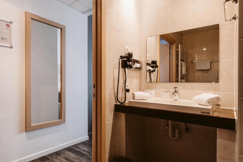 Koupelna v ubytování Serwir Hotel