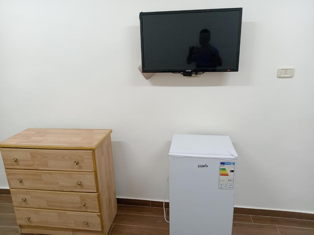 TV a/nebo společenská místnost v ubytování EMILE ALTWAL Madaba