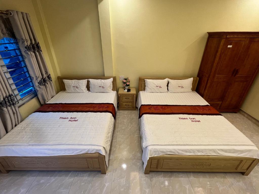 Postel nebo postele na pokoji v ubytování Thien Son Guesthouse