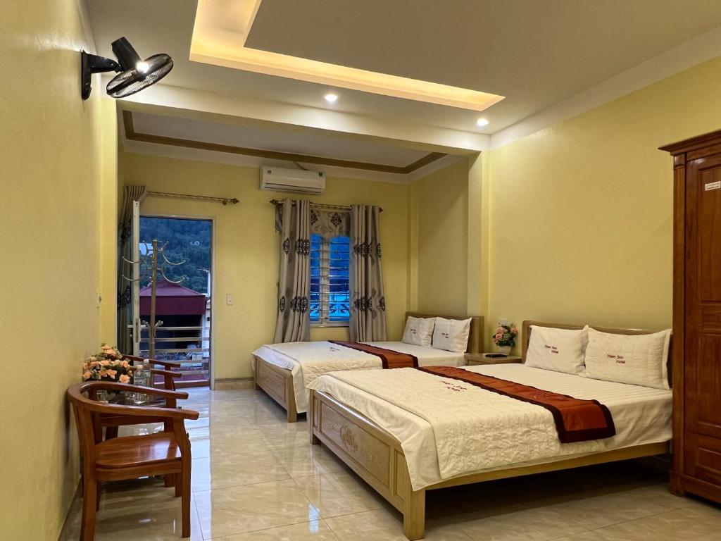 Postel nebo postele na pokoji v ubytování Thien Son Guesthouse