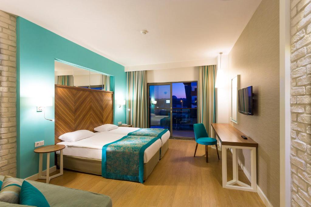 Postel nebo postele na pokoji v ubytování Hotel Terrace Beach Resort All Inclusive