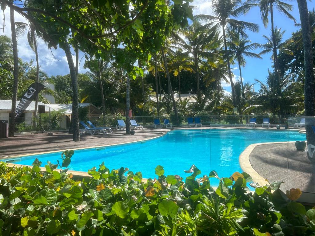 a swimming pool at the resort at Studio Fresh&amp;Cosy Trois-Ilets - 3 étoiles-Hotel Carayou in Les Trois-Îlets