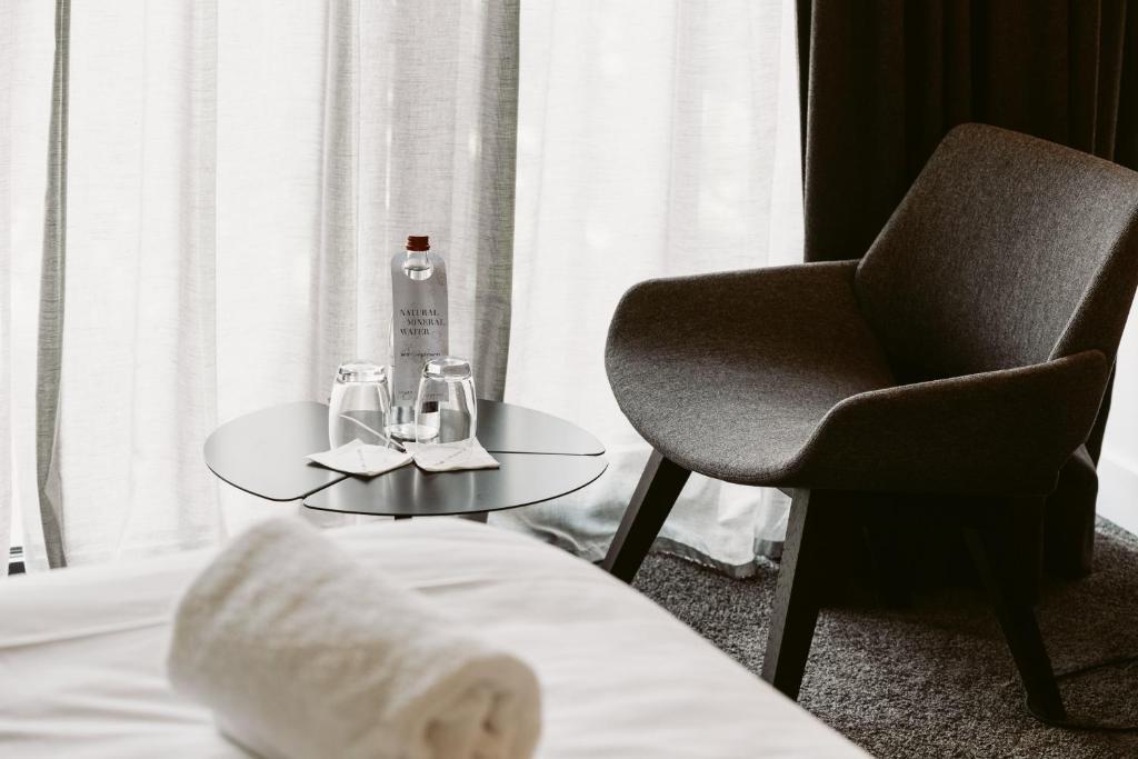 Postel nebo postele na pokoji v ubytování Serwir Hotel
