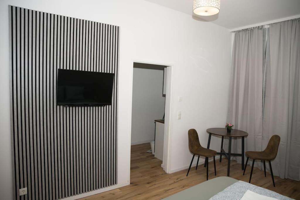 Μια τηλεόραση ή/και κέντρο ψυχαγωγίας στο RRooms Smart Appartement