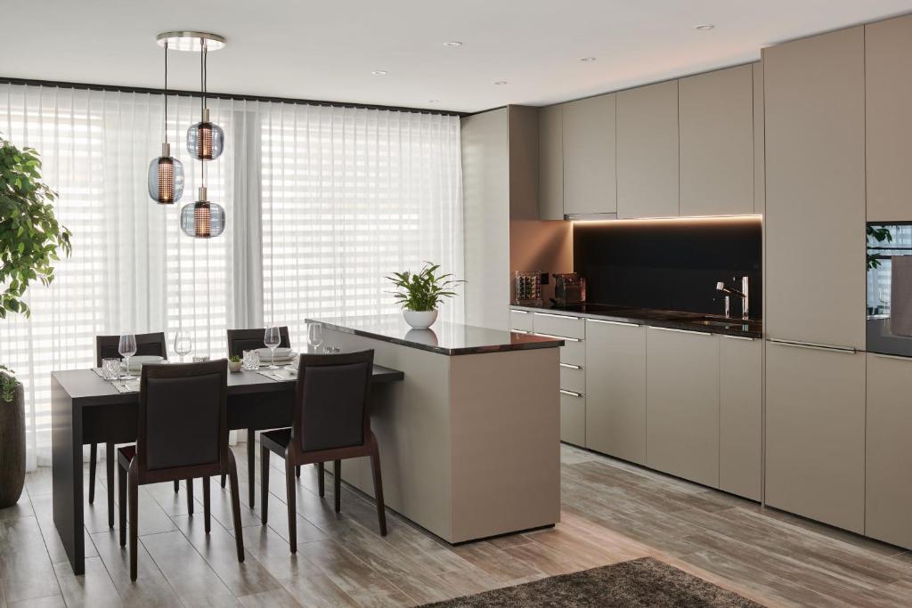Kuchyň nebo kuchyňský kout v ubytování THREE POINT Apartments
