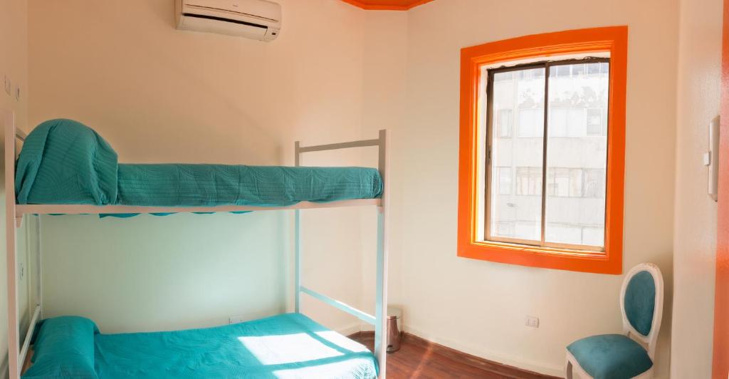 Palanda nebo palandy na pokoji v ubytování Hostal Casa Aborigen