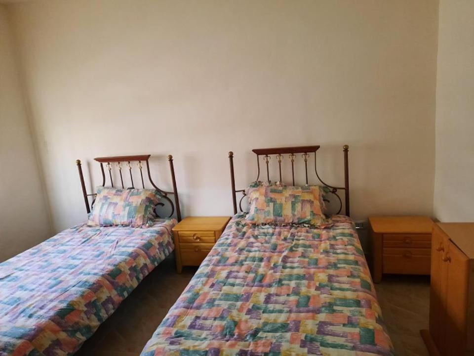 Postel nebo postele na pokoji v ubytování EMILE ALTWAL Madaba