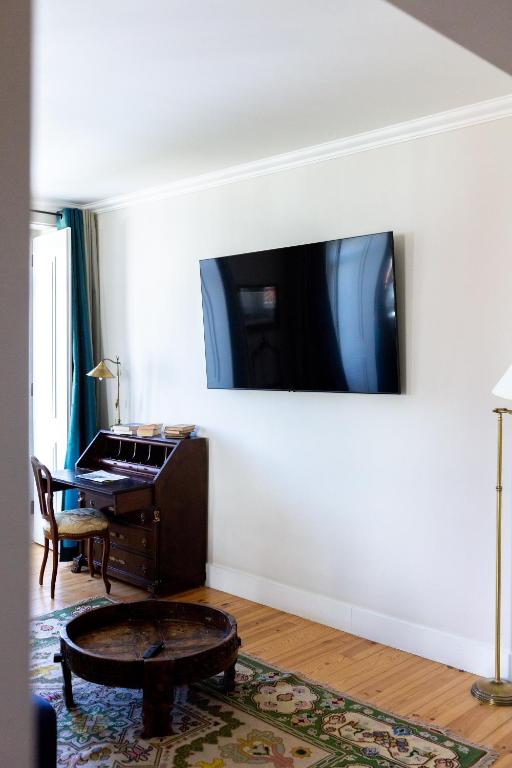 TV a/nebo společenská místnost v ubytování Hotel Alegria
