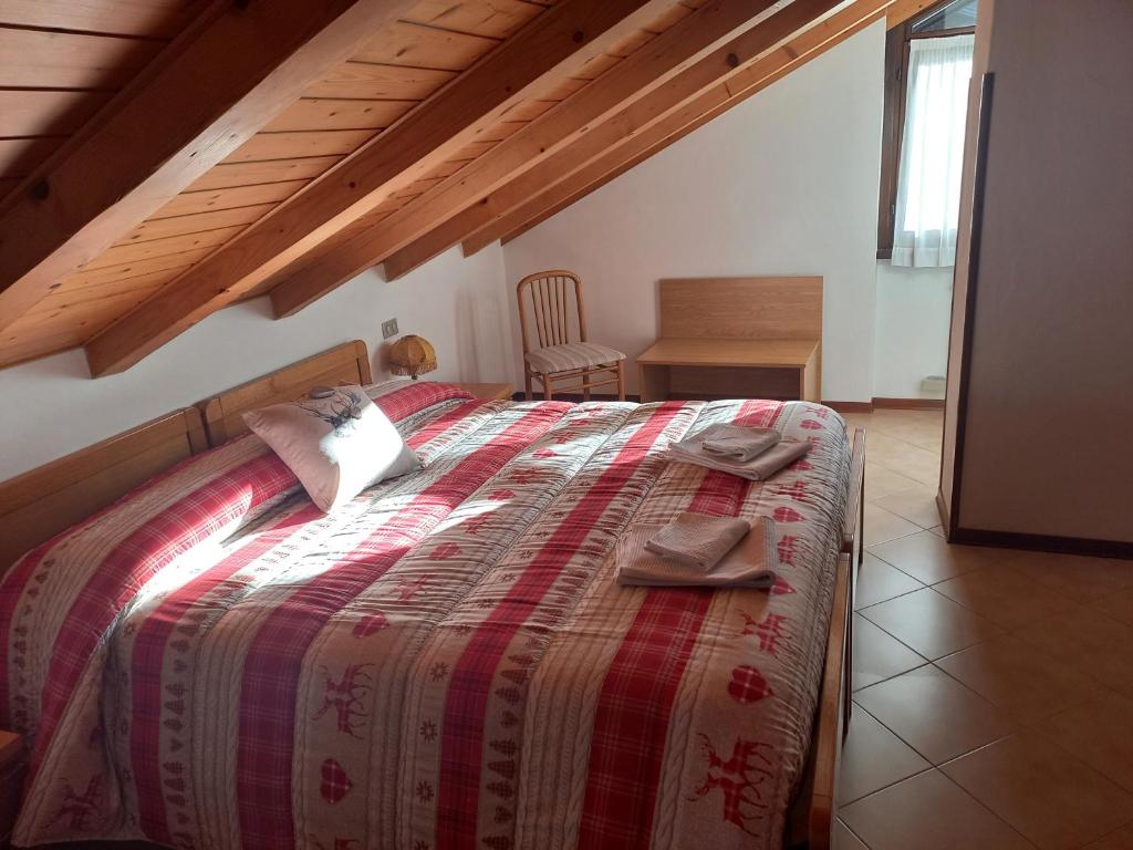 Postel nebo postele na pokoji v ubytování B&B Piazzi di Katia