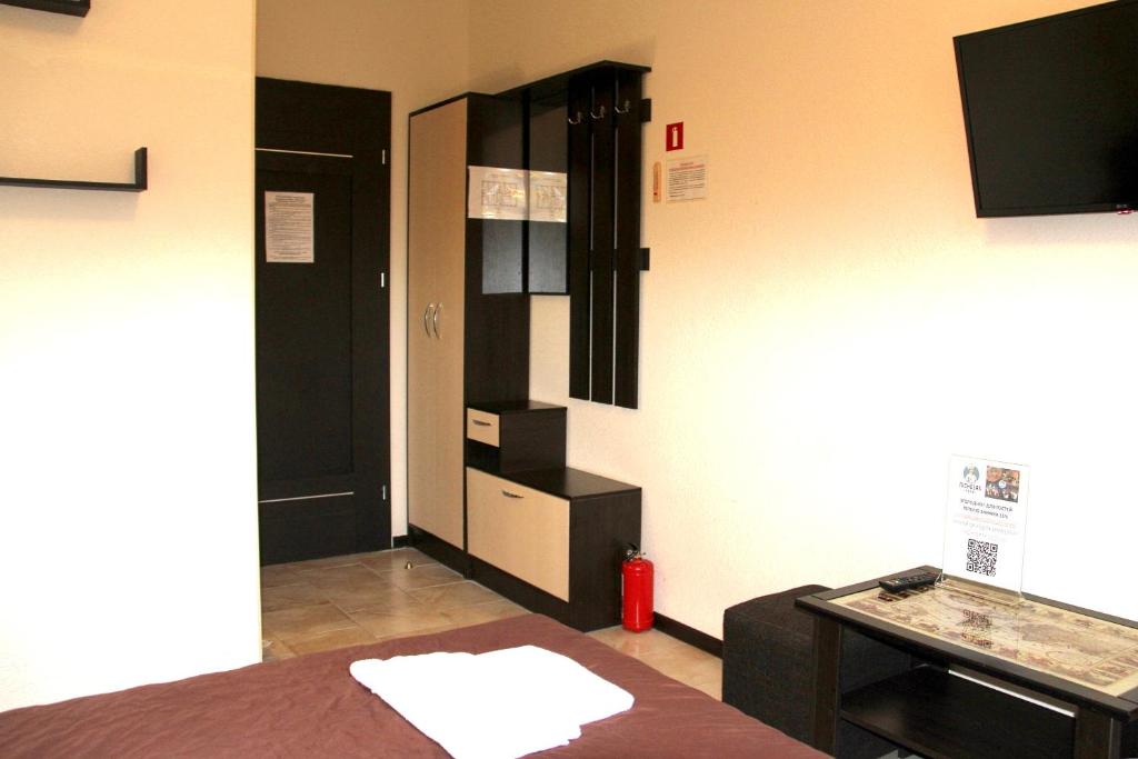 TV a/nebo společenská místnost v ubytování Breeze Hotel
