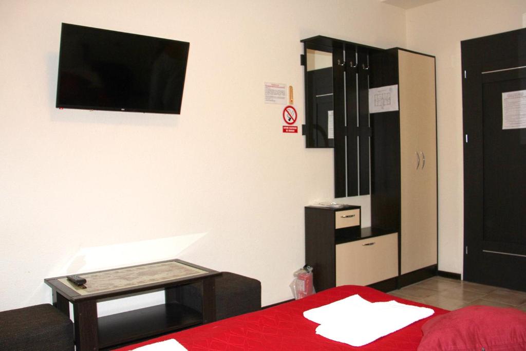 Postel nebo postele na pokoji v ubytování Breeze Hotel