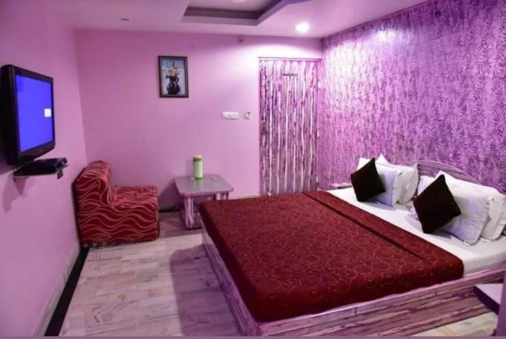 Postel nebo postele na pokoji v ubytování HOTEL HAYAT RESIDENCY