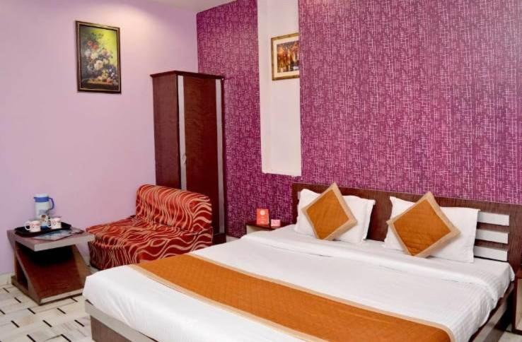 Postel nebo postele na pokoji v ubytování HOTEL HAYAT RESIDENCY