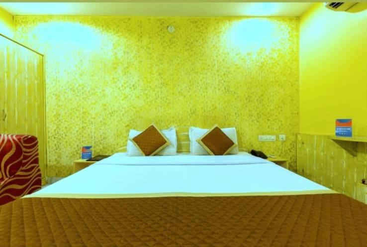 Postel nebo postele na pokoji v ubytování HOTEL HAYAT RESIDENCY