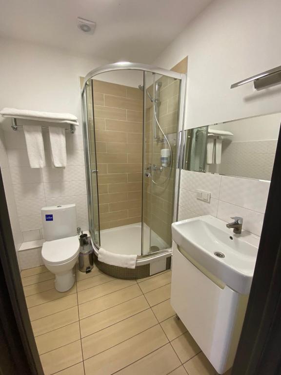 Koupelna v ubytování Afina Aparthotel
