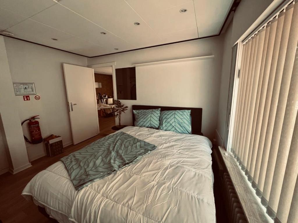 Postel nebo postele na pokoji v ubytování Cozy studio