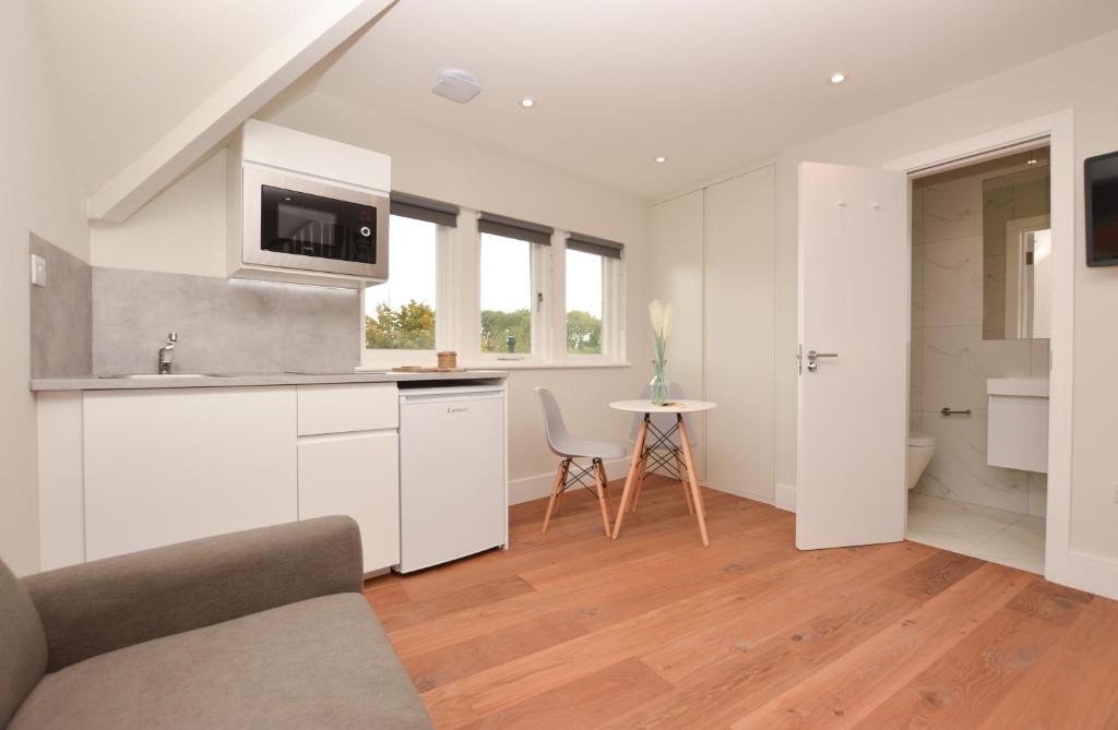 Kuchyň nebo kuchyňský kout v ubytování Golders Green Serviced Apartments by Concept Apartments