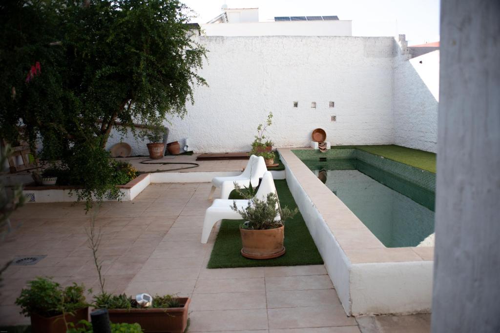 The swimming pool at or close to Casa Rural Santa Ana