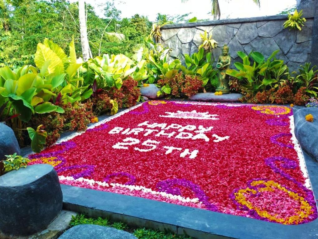 a rangoli in the garden at a festival of flowers at PONDOK KUNGKANG VILLA 2 in Ubud