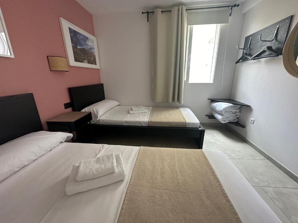Postel nebo postele na pokoji v ubytování Villa 8 Islas