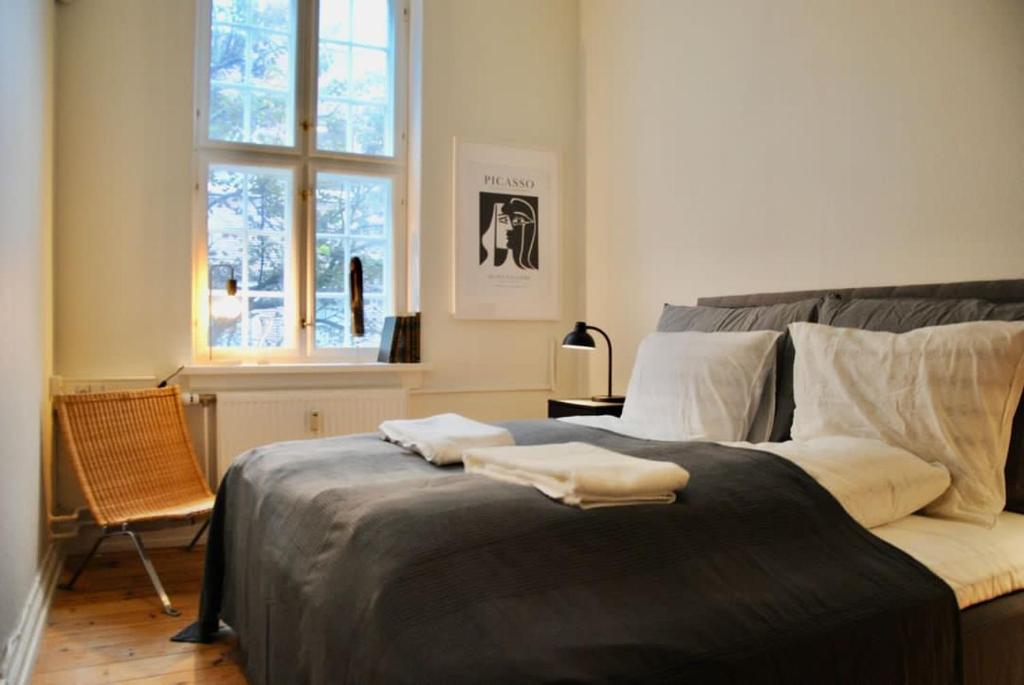 Postel nebo postele na pokoji v ubytování Aparthotel Mageløs 12