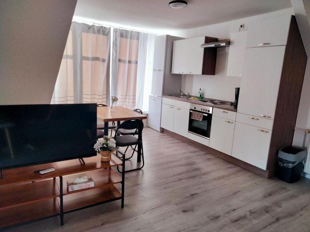 Kuchyň nebo kuchyňský kout v ubytování Apartment 6 - Haus Lausitzring