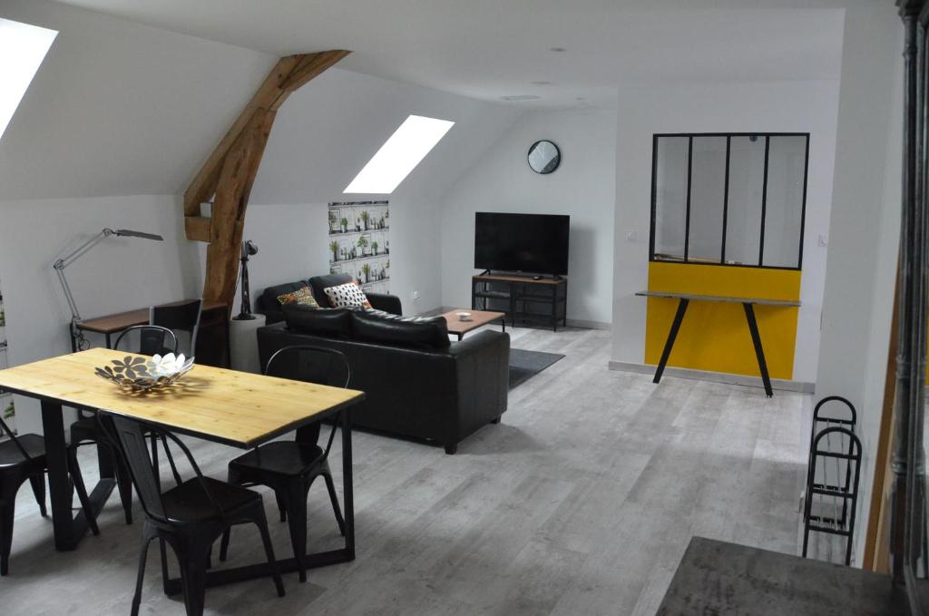 TV a/nebo společenská místnost v ubytování habitation style industruel