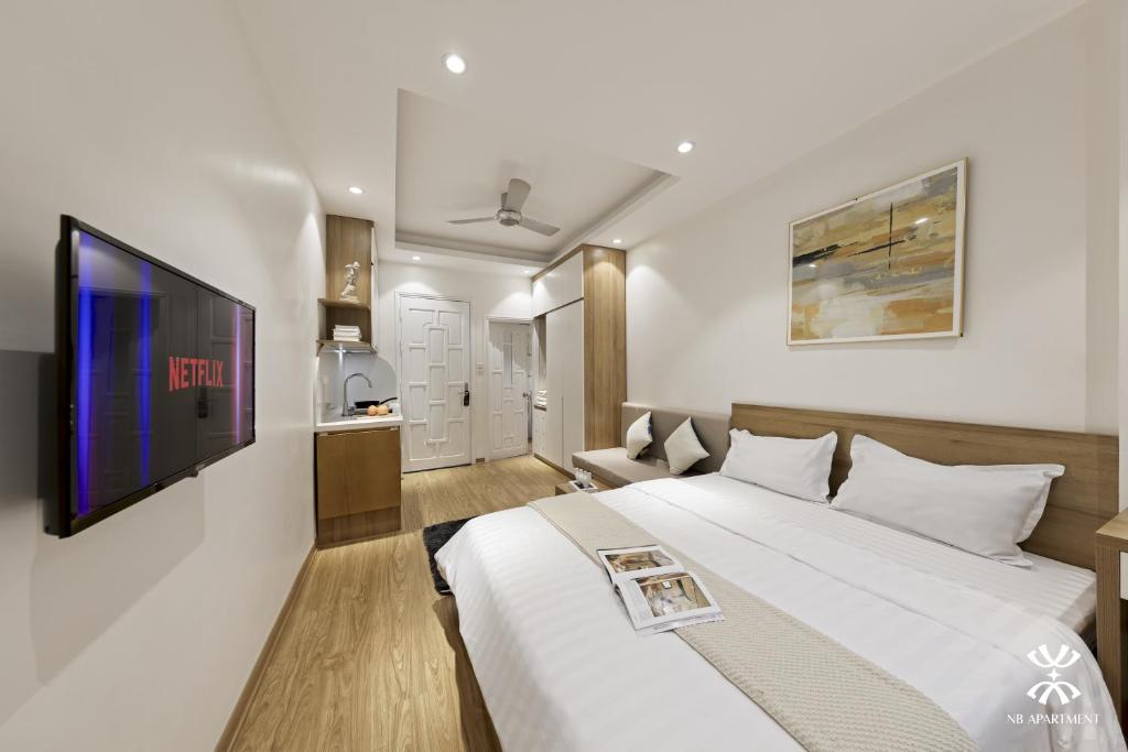 TV/trung tâm giải trí tại NB APARTMENT-LINH LANG
