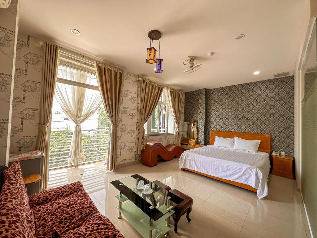 Giường trong phòng chung tại Hotel Phu Hai