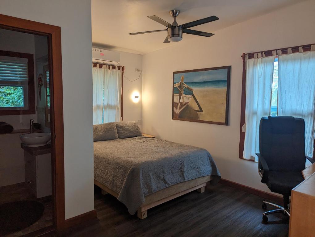 Postel nebo postele na pokoji v ubytování TropicalArts Resort&Studios