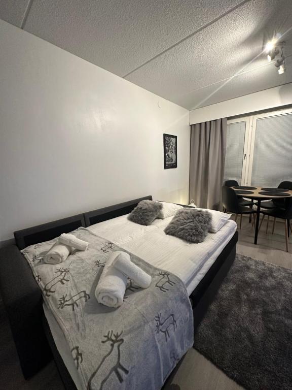 Postel nebo postele na pokoji v ubytování Apartment Ahkiomaantie