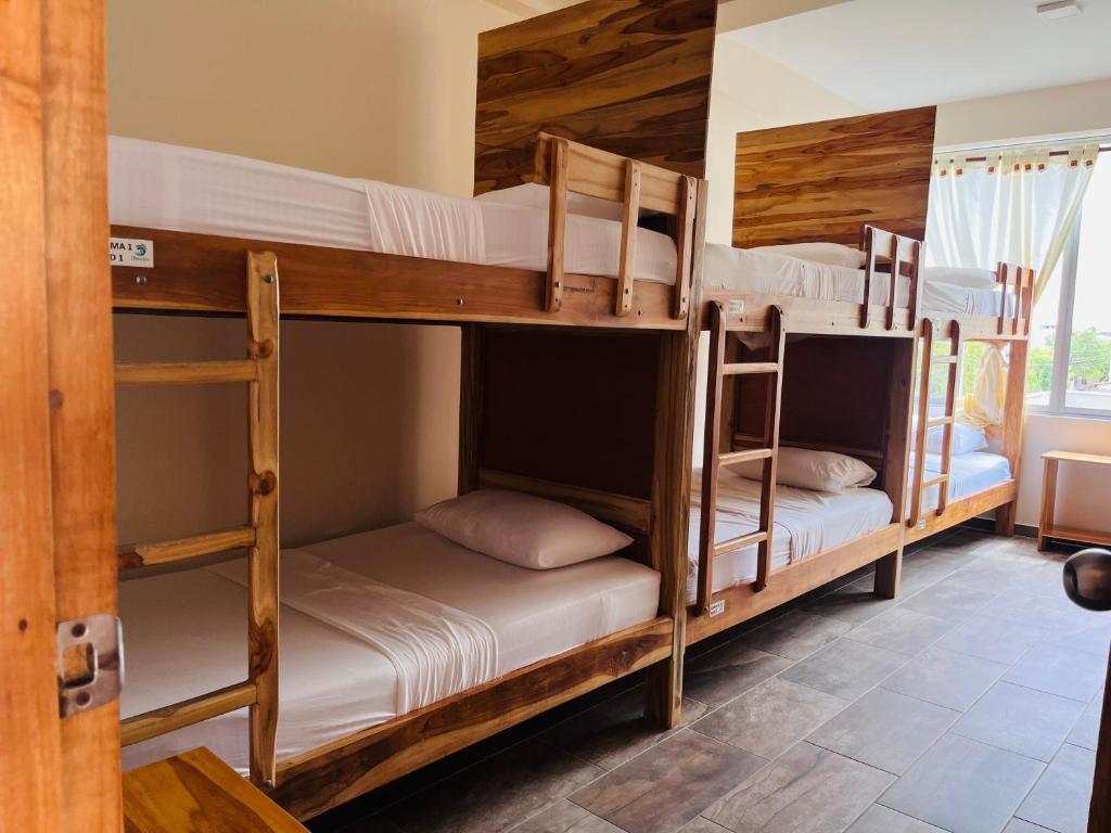 Postel nebo postele na pokoji v ubytování Merakai Hostel Rincon del Mar