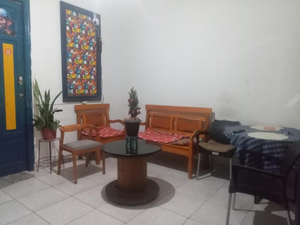 Khu vực ghế ngồi tại SapucAli Hostel Privativo