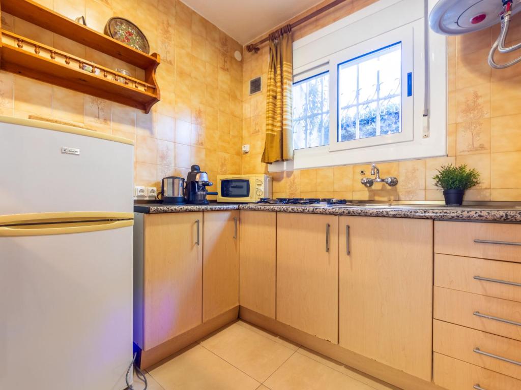 A kitchen or kitchenette at Apartment Oasis by Interhome