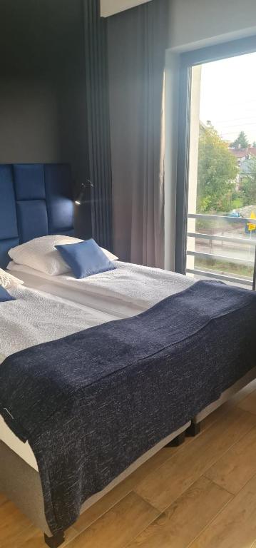 Postel nebo postele na pokoji v ubytování Rybacka