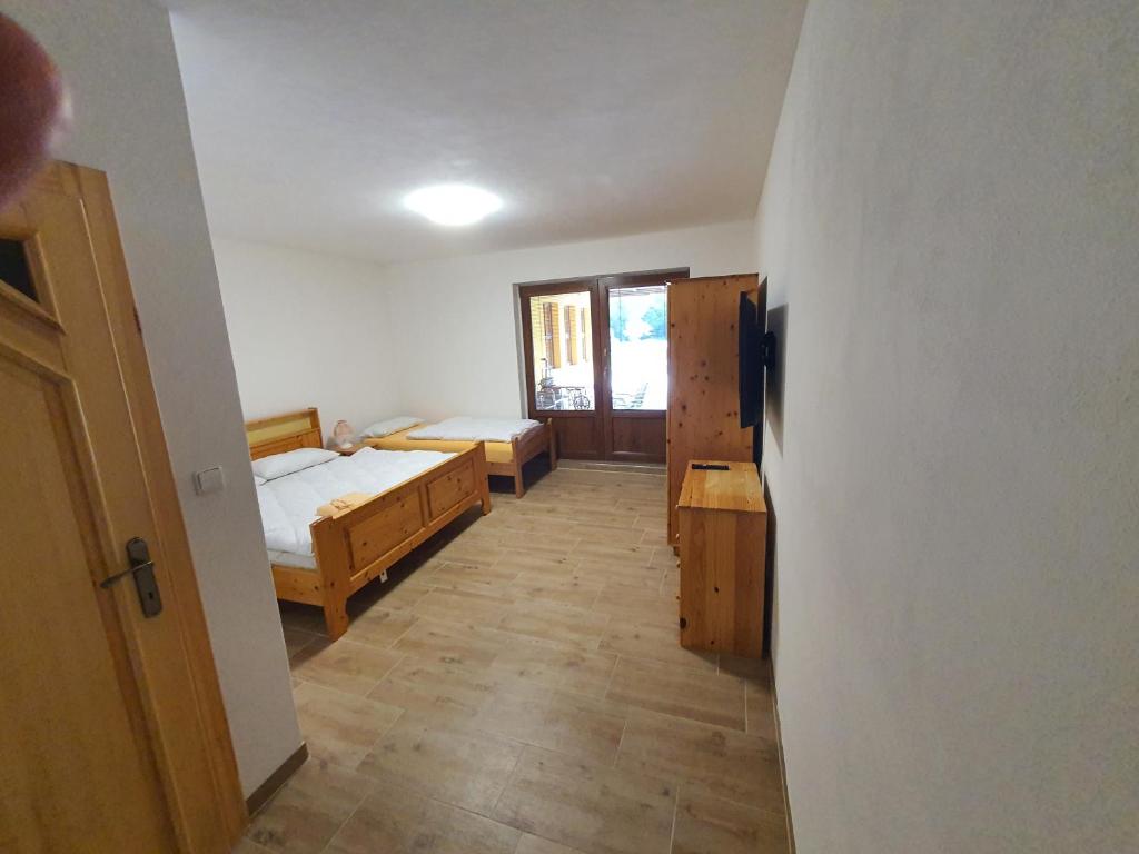 Postel nebo postele na pokoji v ubytování Farma Horní Paseky u Aše