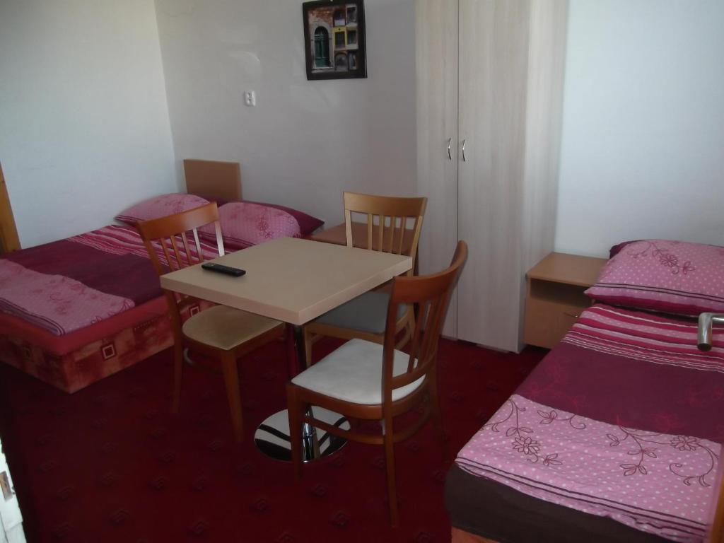 Postel nebo postele na pokoji v ubytování Penzion Apartmány Zlín