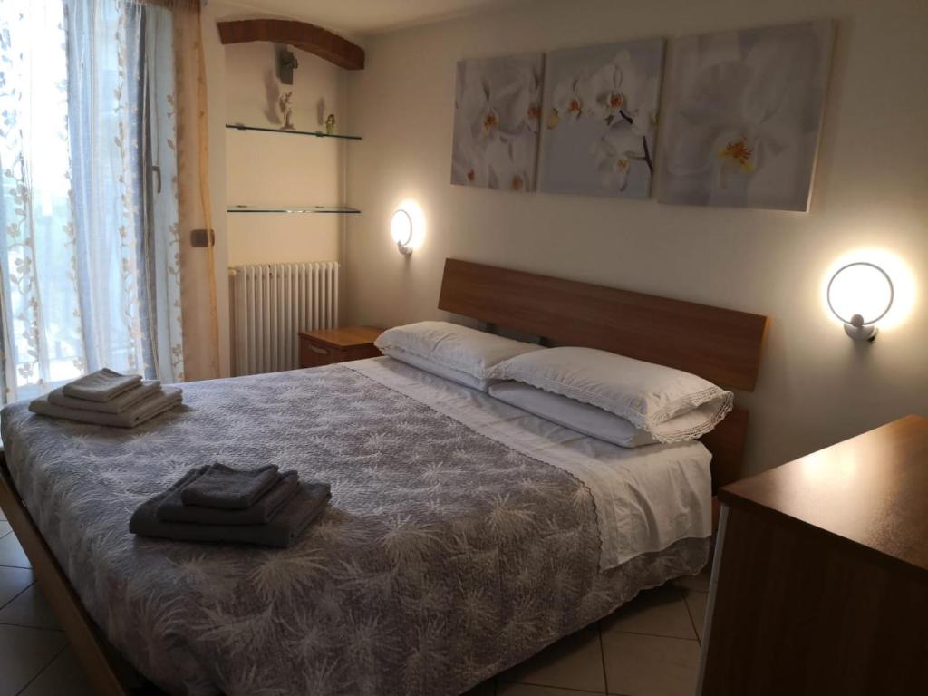Postel nebo postele na pokoji v ubytování Casetta a Monte Sant'á