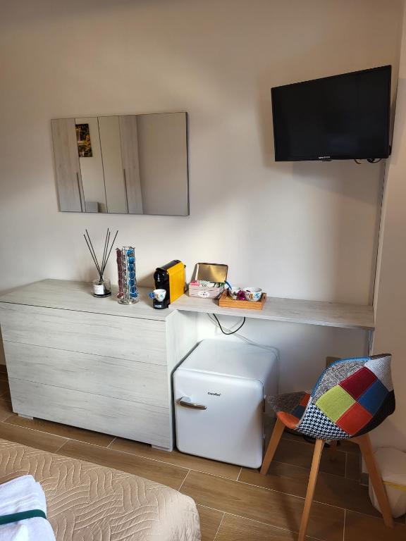TV a/nebo společenská místnost v ubytování Di Gioia Home B&B