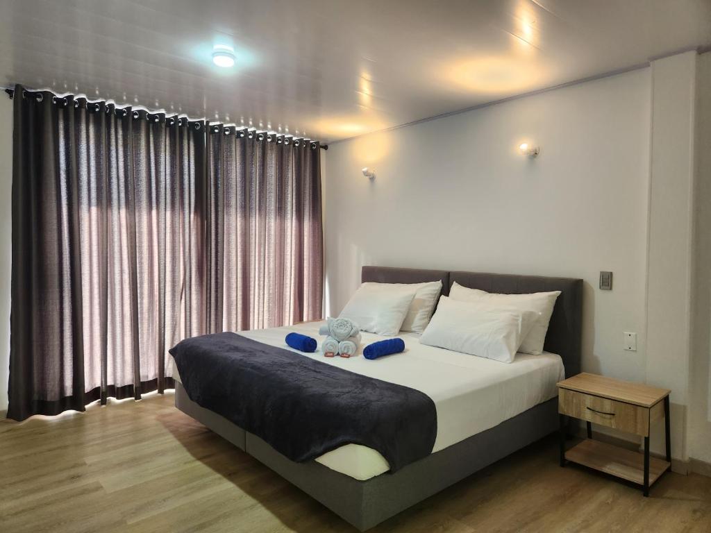 Ένα ή περισσότερα κρεβάτια σε δωμάτιο στο Hotel nelumbo