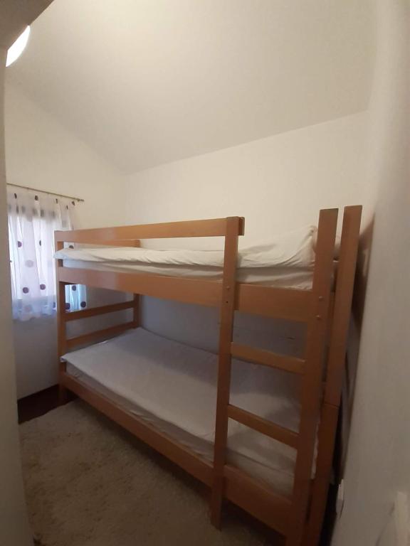 Postel nebo postele na pokoji v ubytování Apartmani Zaara