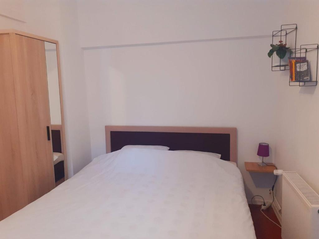 Postel nebo postele na pokoji v ubytování Apartmani Zaara