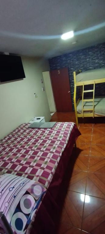 Postel nebo postele na pokoji v ubytování Hostal El Auténtico Diamante