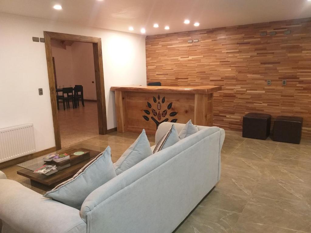 Posezení v ubytování Hotel y Cabañas Pulegan