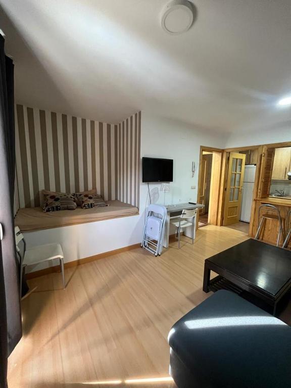 A television and/or entertainment centre at BUENAVISTA DELUXE
